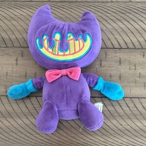 Colorful Plush Toy with Pink Bow